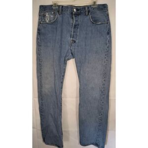 Levi's 501 Original Fit button fly closure straight leg. Five-pocket styling wit